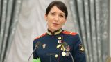 Первая женщина — Герой России на СВО: Путин вручил Звезду медсестре Болилой